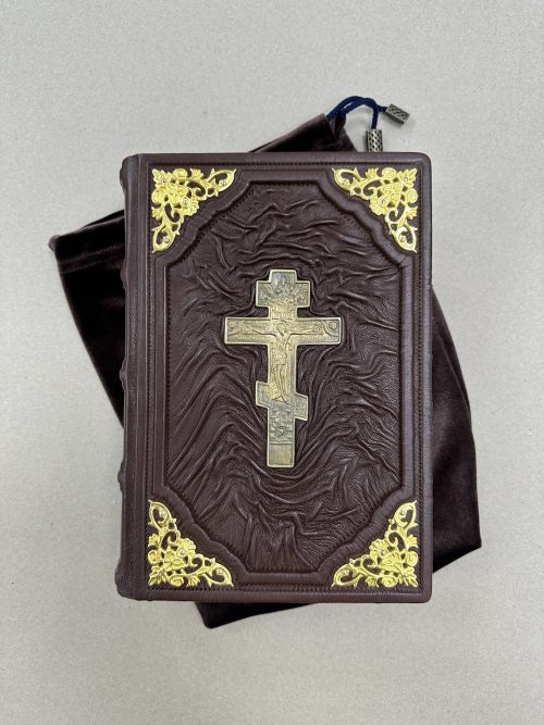 библия с крестом в мешочке